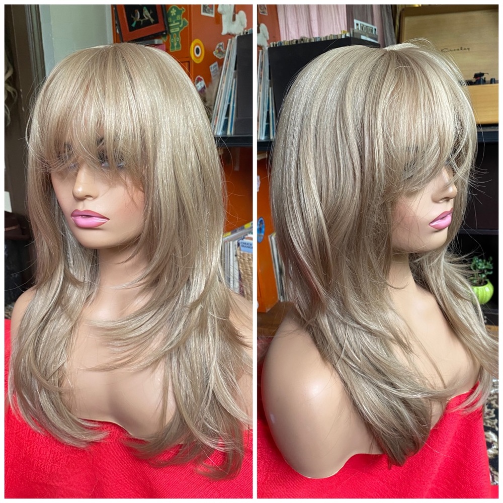 - Sandy fawn blonde layered ultra real wig